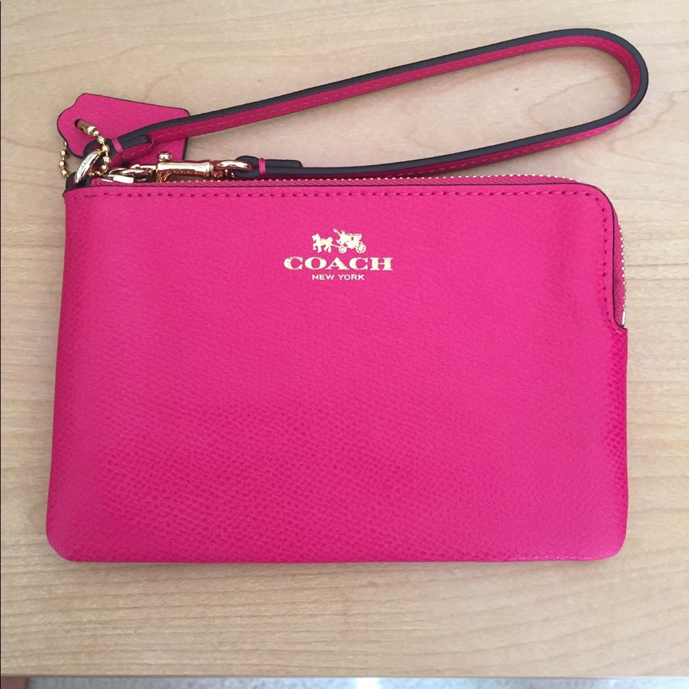 Hot pink Coach leather wristlet